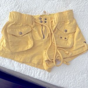 These are a small. Great yellow color. Worn once.